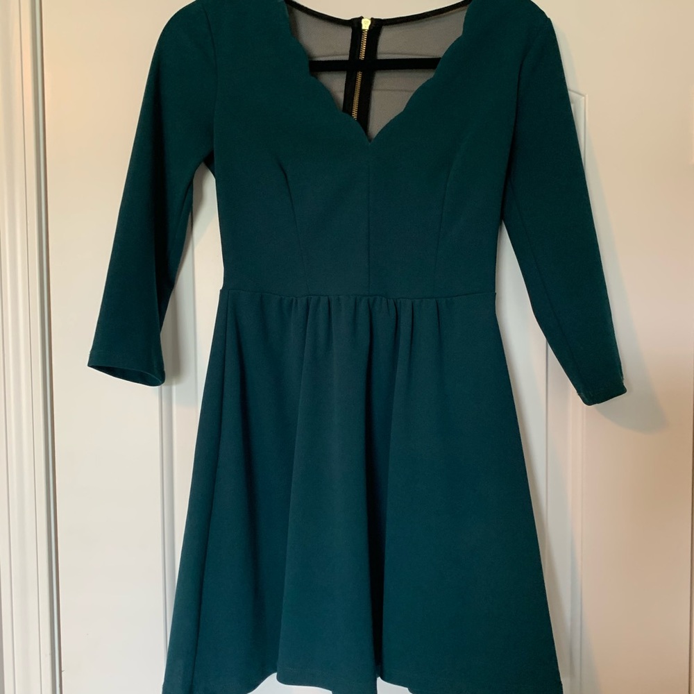 emerald green mesh back dress. size small.